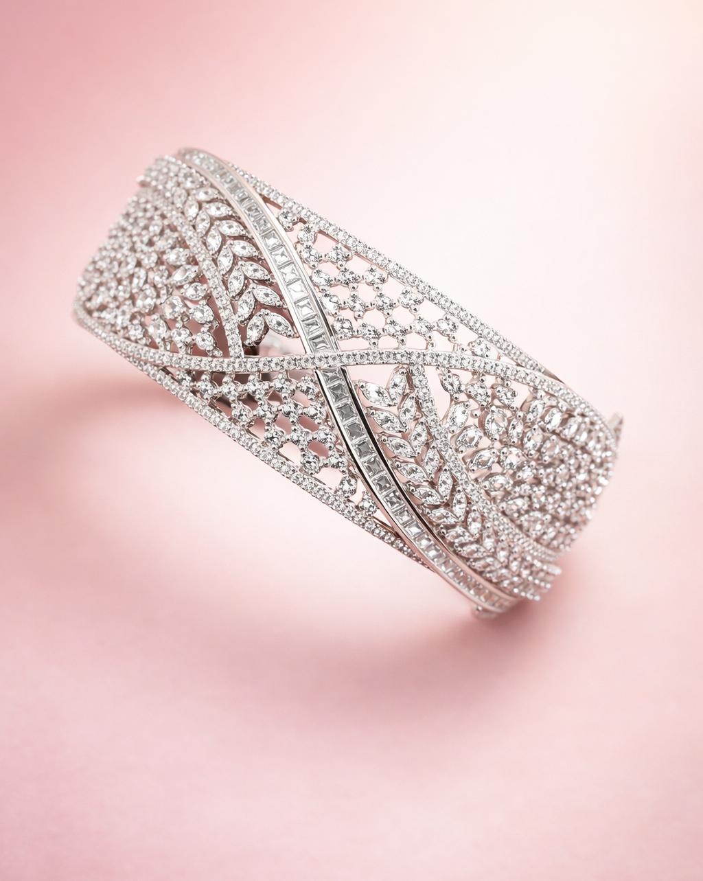 Elegant diamond bracelet on a soft pink background