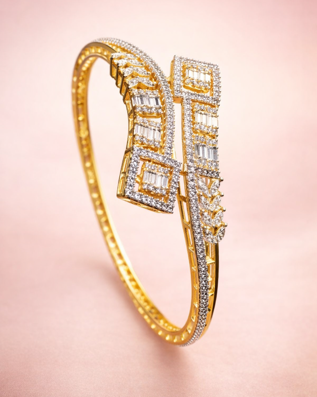 Gold bracelet with diamond accents on a pink background