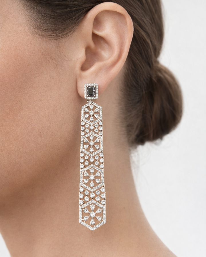 Earring worn by a person with a neutral background