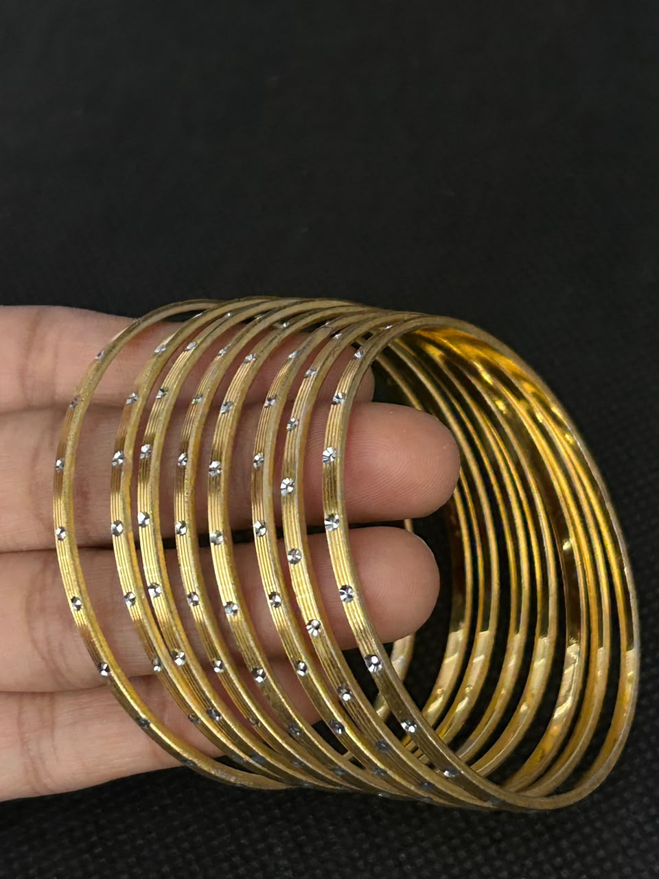Swarna Rekha Gold-Tone Stone-Studded Thin Bangles Set ( set of 8 )