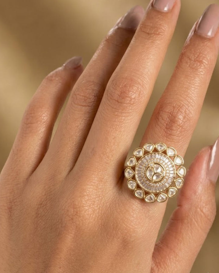 Shop the Aarohi Halo Kundan CZ Statement Ring featuring premium Kundan stones, baguette .,