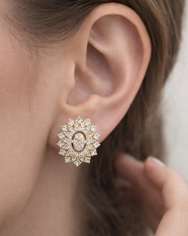 Close-up of an ear wearing a diamond earring with a blurred background