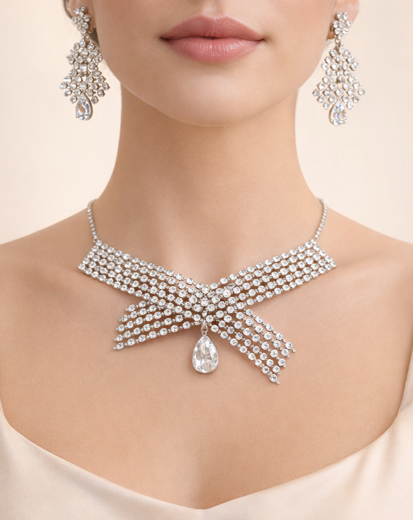 Diamond necklace and earrings on a model against a beige background