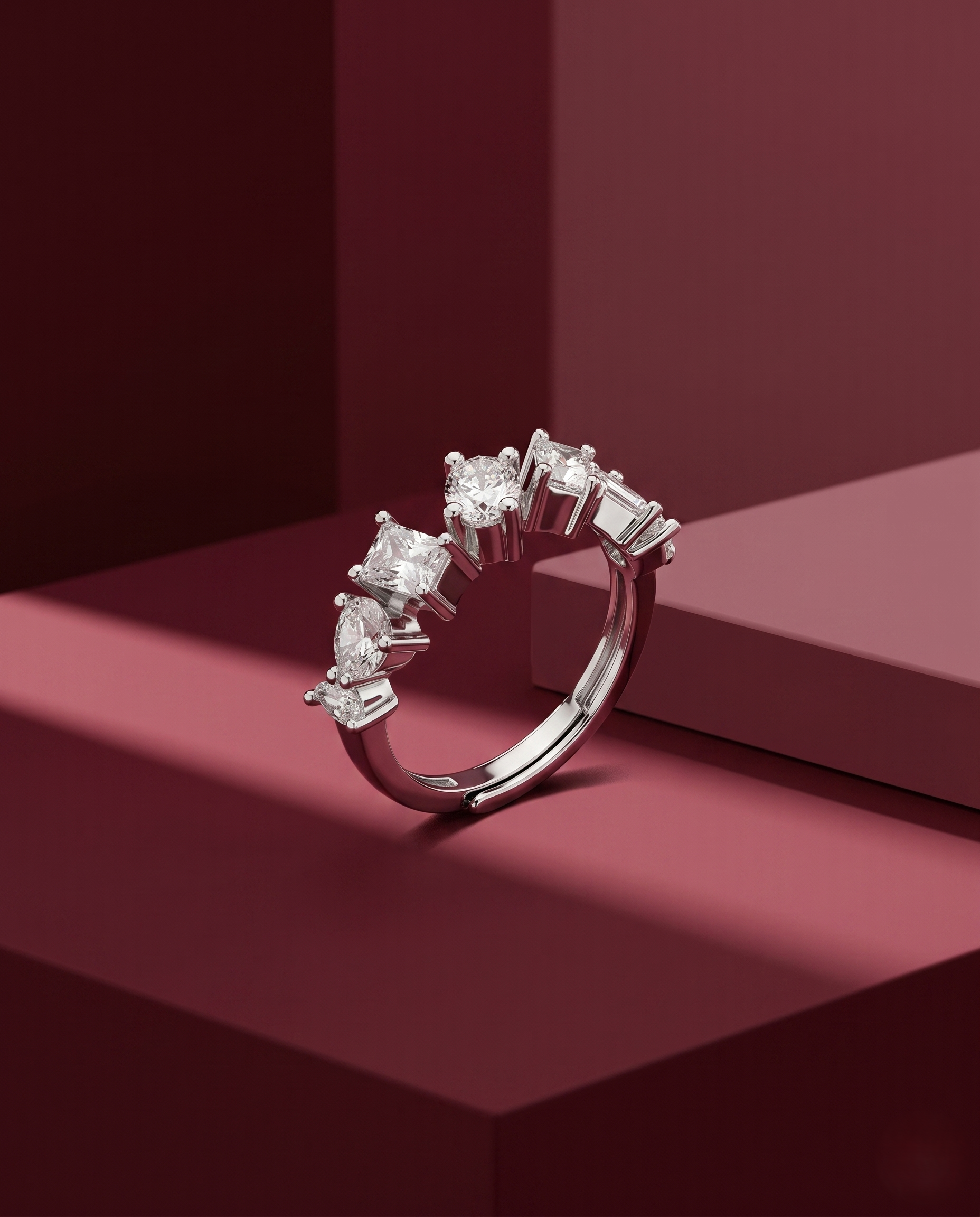Diamond ring on a red geometric background