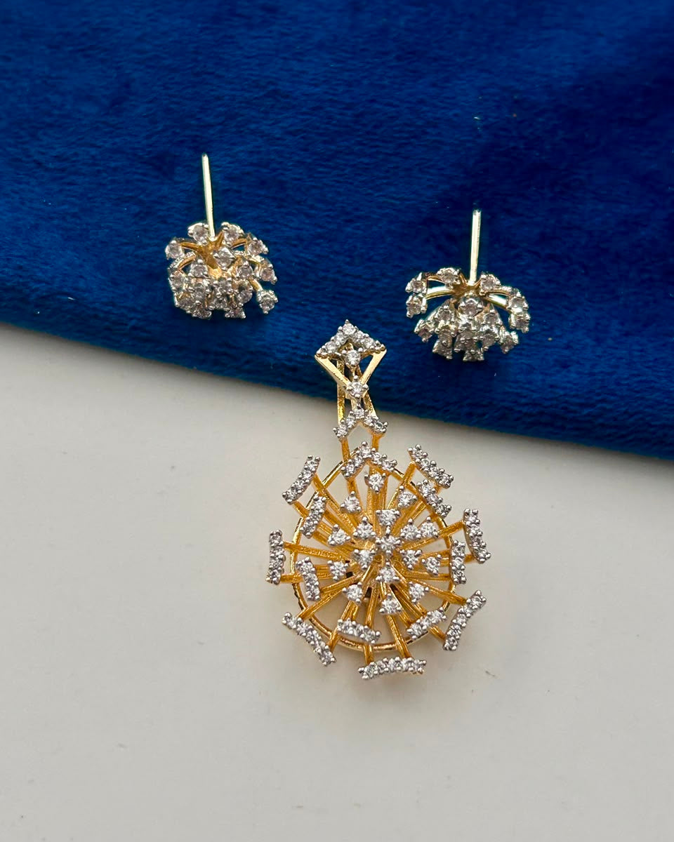 The Aurora Starburst CZ Pendant Set showcases a dazzling starburst-inspired design crafted with brilliant