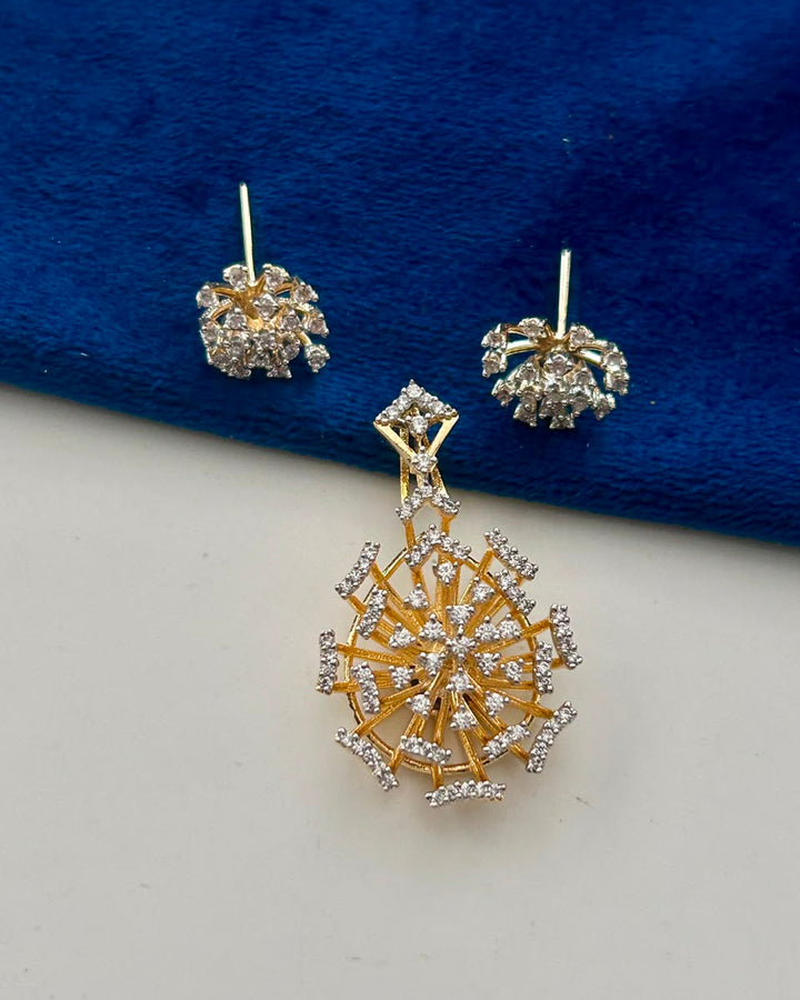 The Aurora Starburst CZ Pendant Set showcases a dazzling starburst-inspired design crafted with brilliant