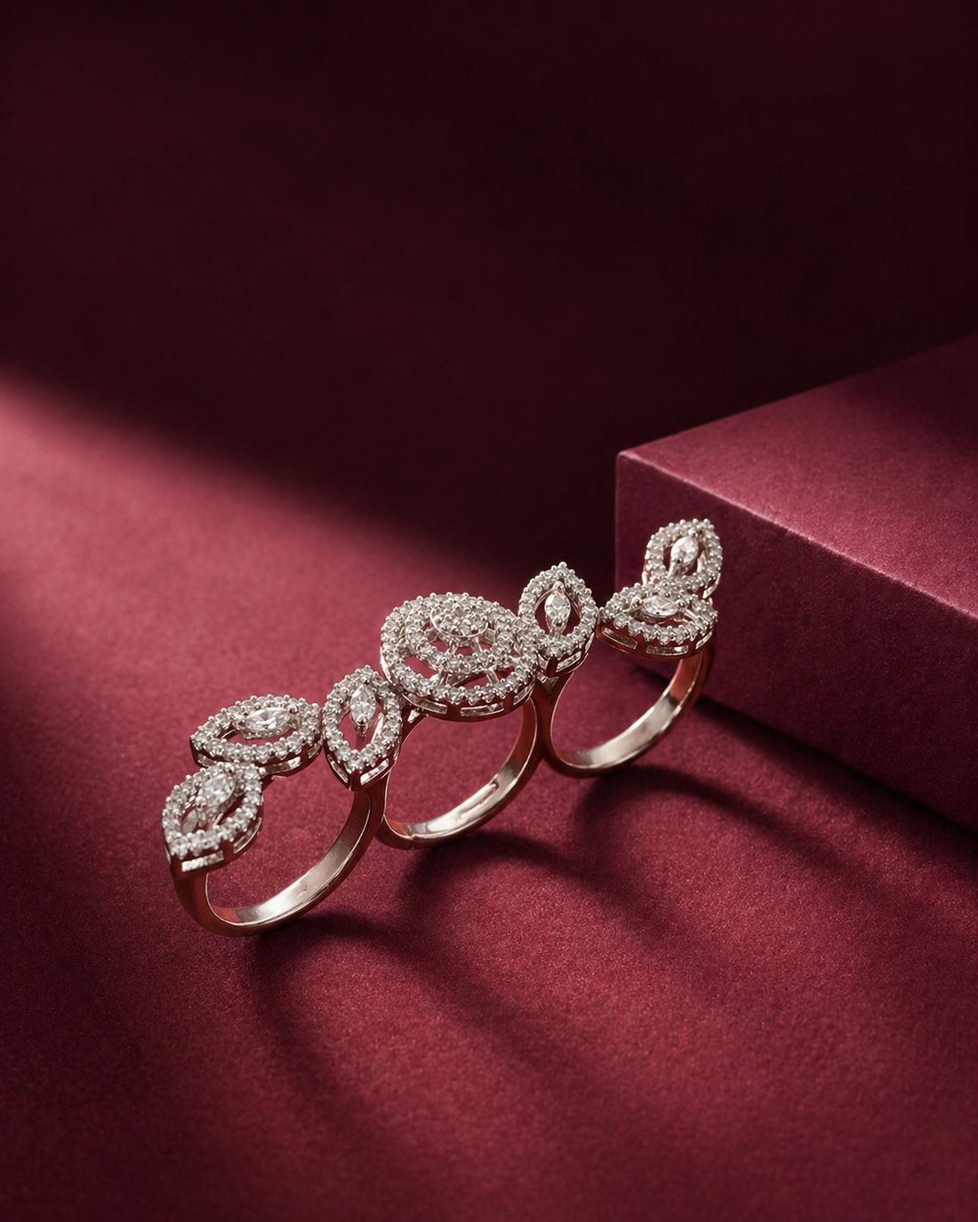 Elegant diamond bracelet on a red fabric background