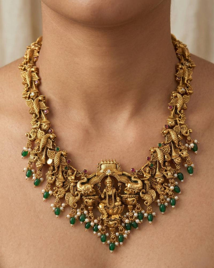 Antique Gold Lakshmi Temple Haram Necklace Set with Pearl and Green Bead Drops