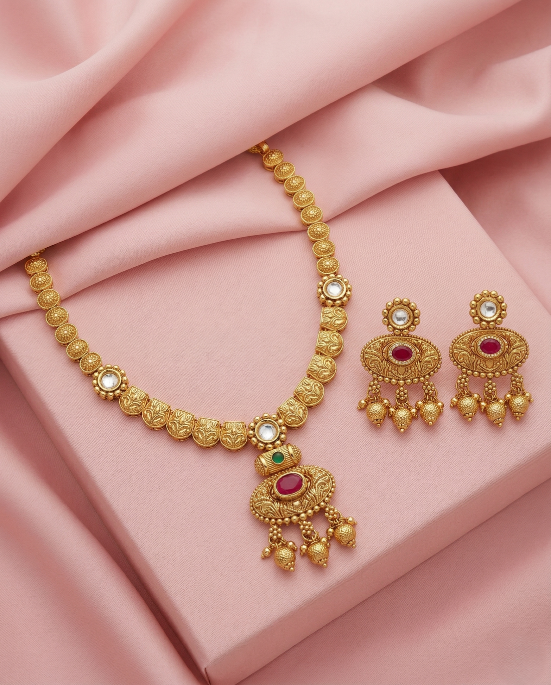 Traditional Gold Finish Necklace Set with Pink & Green Stone Pendant and Ghungroo Drops