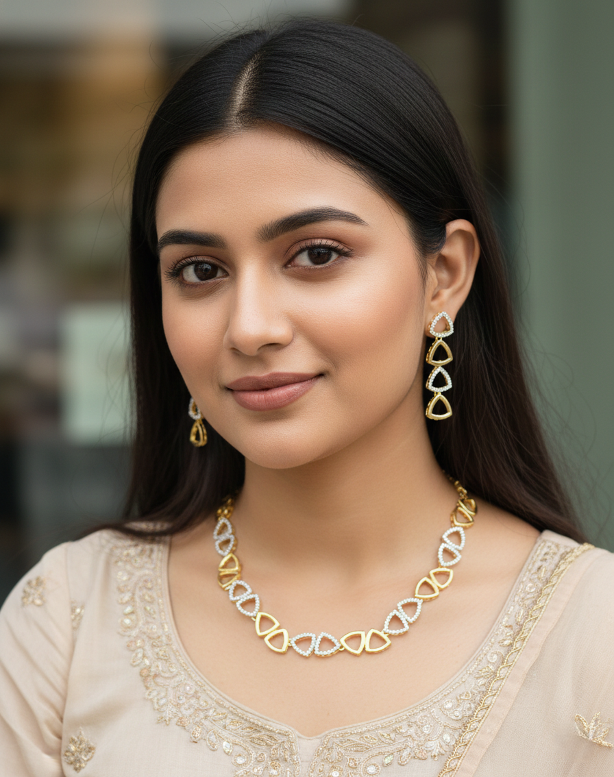 Woman wearing gold jewelry with a blurred background