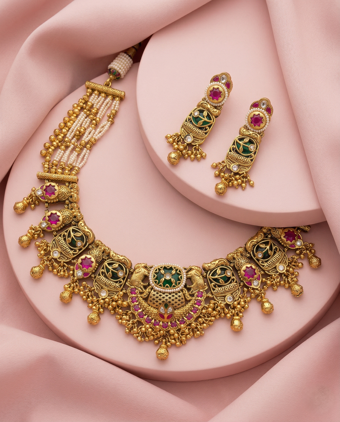 Traditional Gold Finish Pearl Necklace Set with Green Enamel & Pink Stone Work