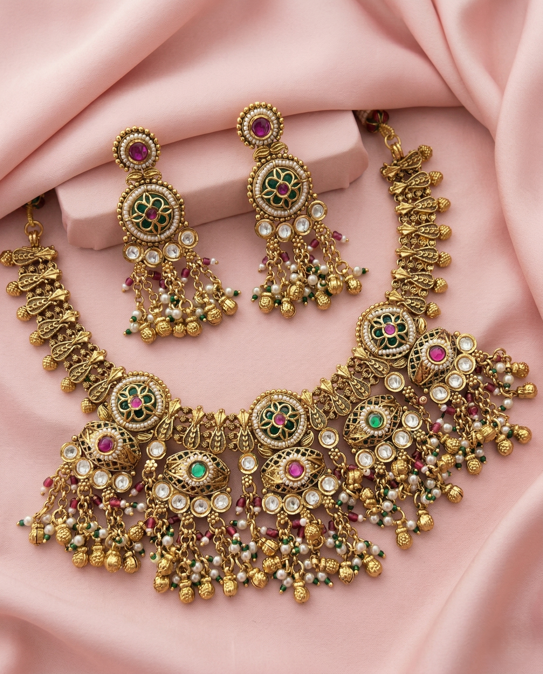 Traditional Gold Finish Temple Necklace Set with Green Enamel, Pink Stones & Pearl Drops