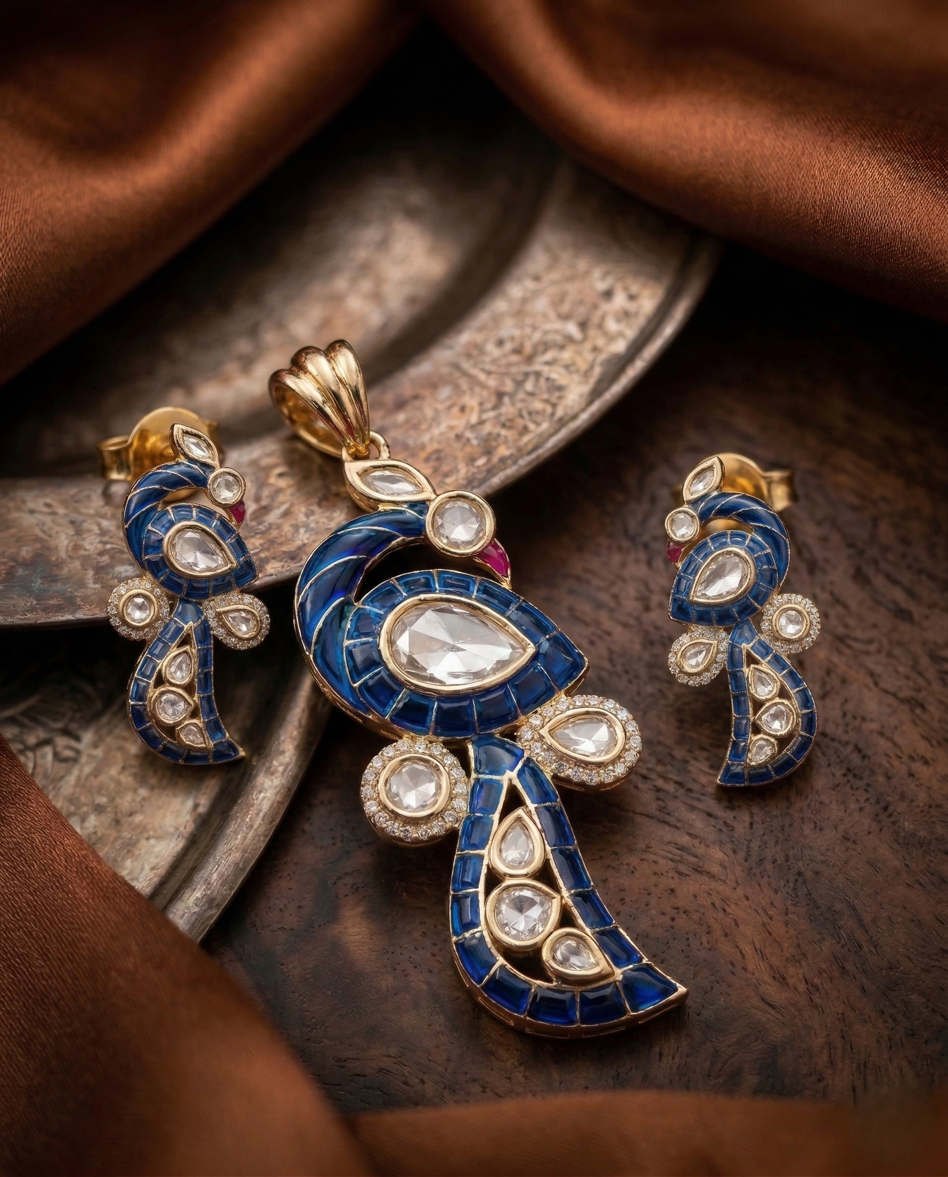 Paisley Kundan Pendant Set with Earrings in Emerald, Ruby Pink and Royal Blue