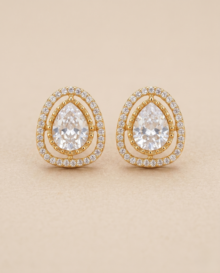 Oval Crystal Double Halo Stud Earrings with Micro Stone Border in Gold Finish