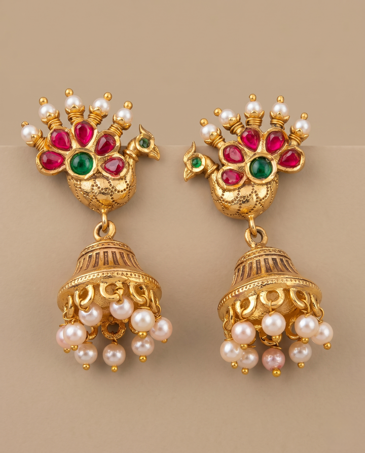 Antique Gold Peacock Motif Temple Jhumka Earrings with Red Green Stones & Pearl Drops