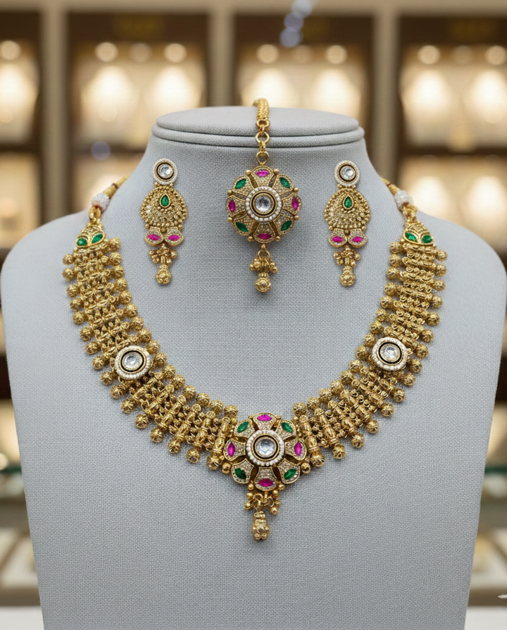 Traditional Gold Finish Choker Necklace Set with Green & Pink Stones and Ghungroo Work