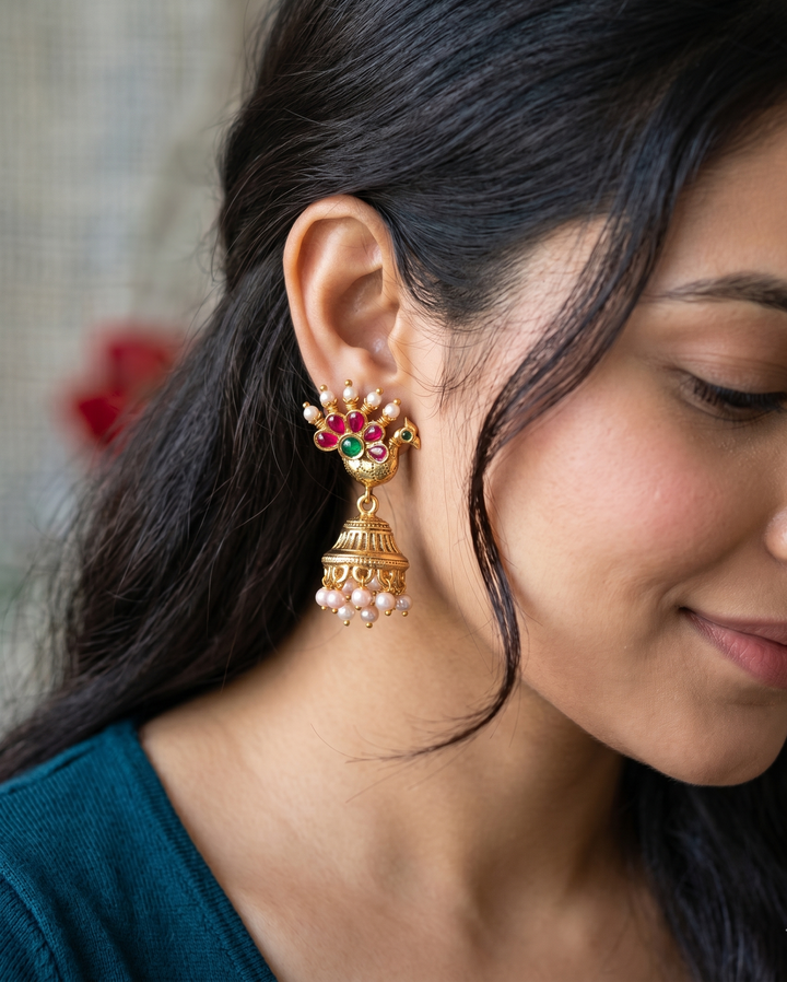 Antique Gold Peacock Motif Temple Jhumka Earrings with Red Green Stones & Pearl Drops