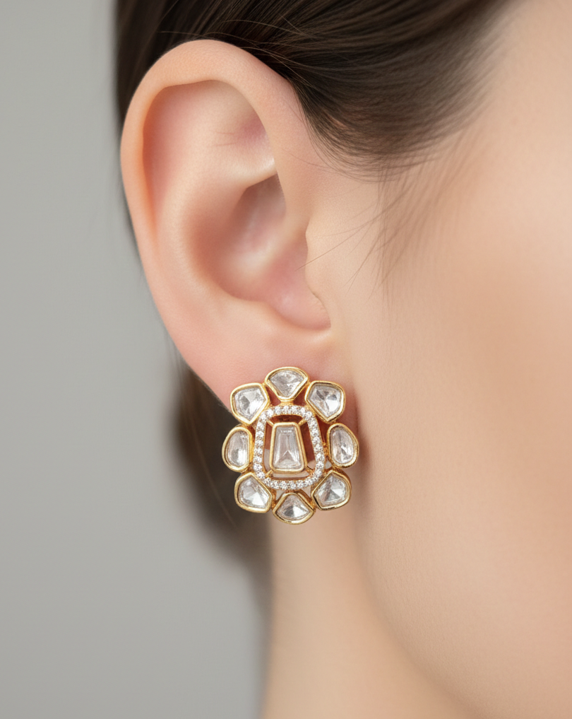 Earring worn on an ear with a neutral background