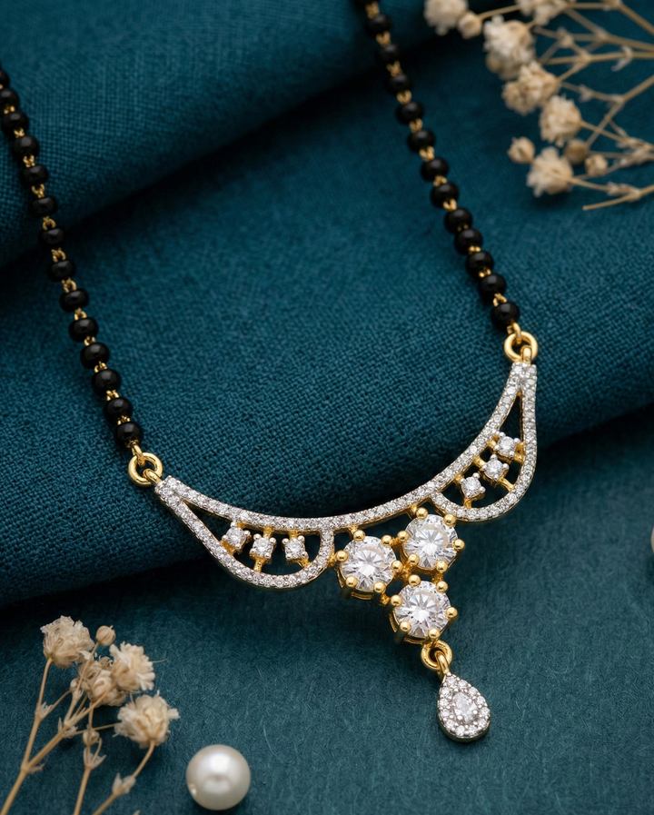 Designer Diamond-Style Mangalsutra with Curved Pendant & Floral Stud Earrings – Daily Wear
