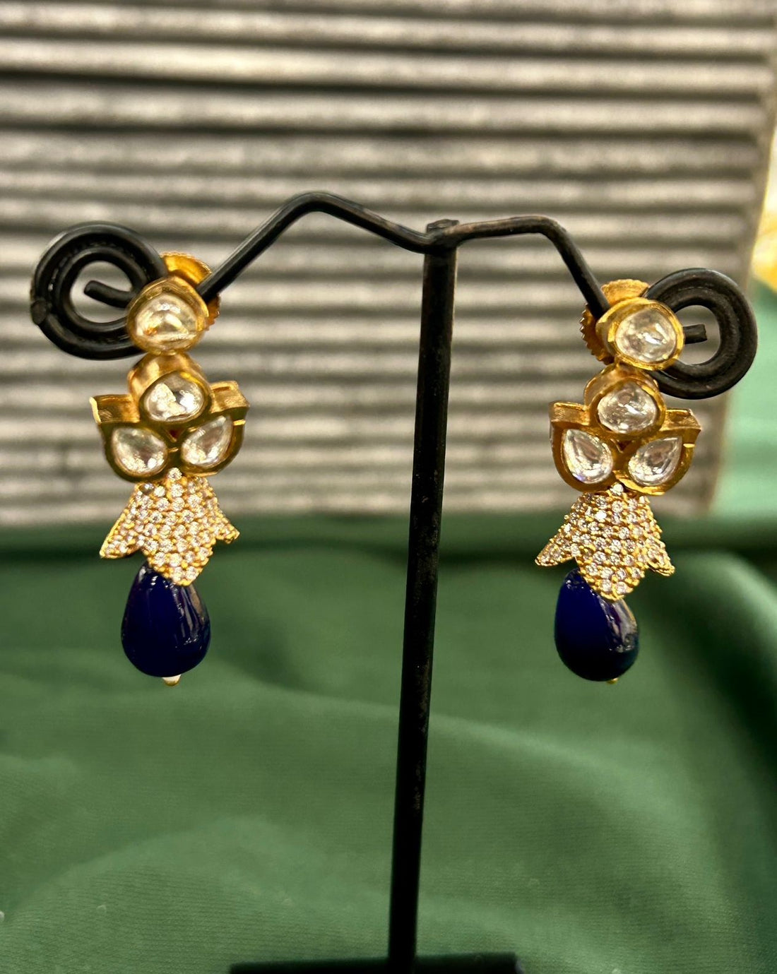 Traditional jewellery ensemble featuring deep blue beads and kundan craftsmanship