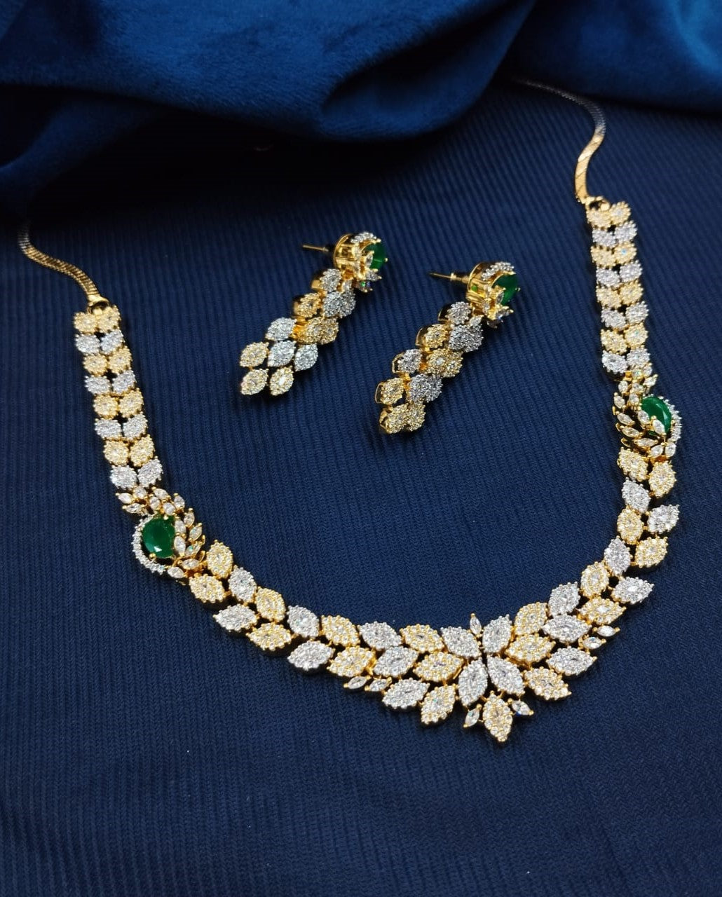 Traditional gold finish emerald-tone necklace and earring set, bridal and festive jewellery to buy online