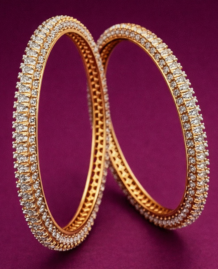 Women’s elegant bangles featuring refined crystal sparkle and gold tone