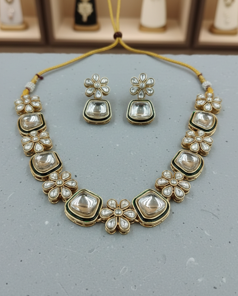 Square kundan necklace set paired with floral earrings in gold polish