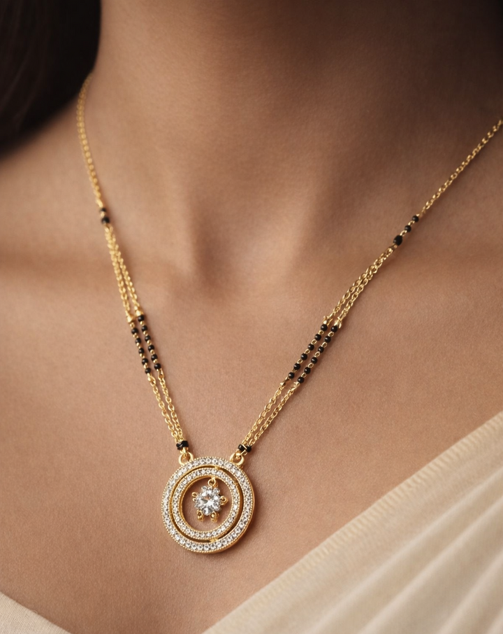 Double circle pendant mangalsutra necklace accented with classic black beads