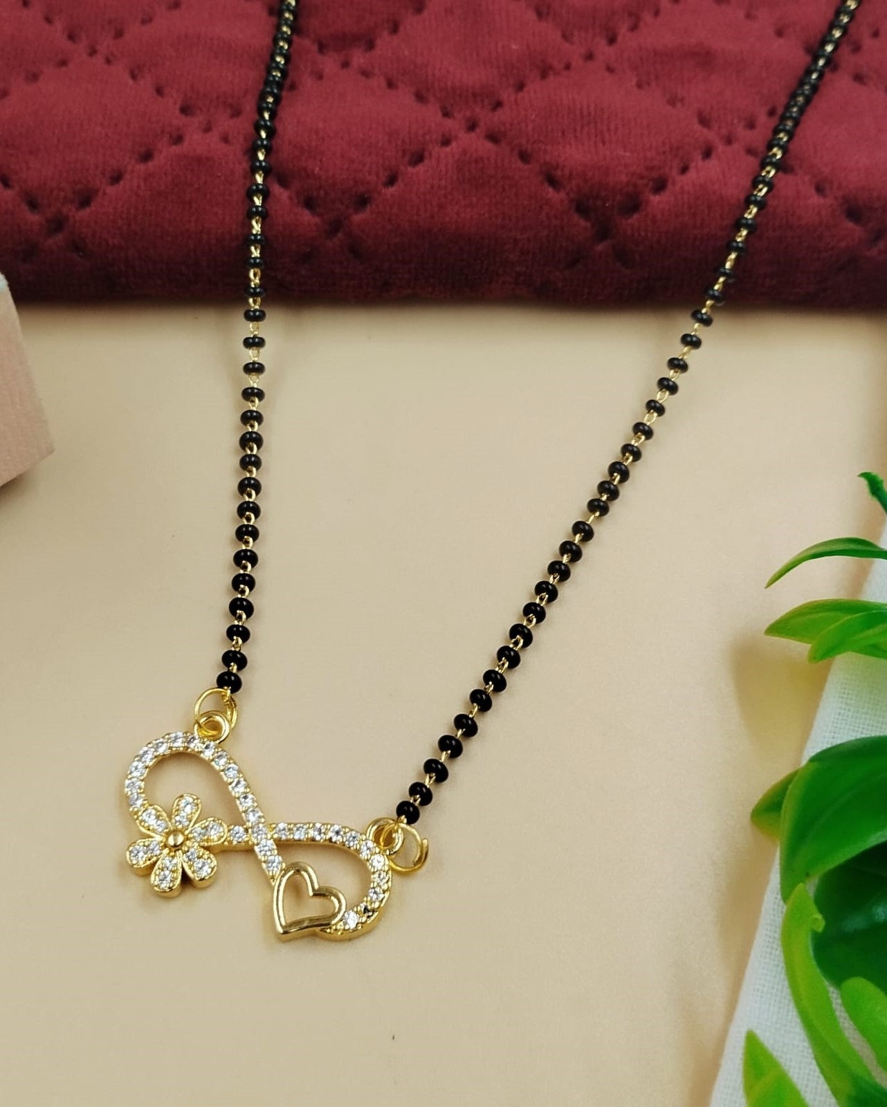 Elegant women’s mangalsutra crafted with heart and infinity motif and subtle sparkle