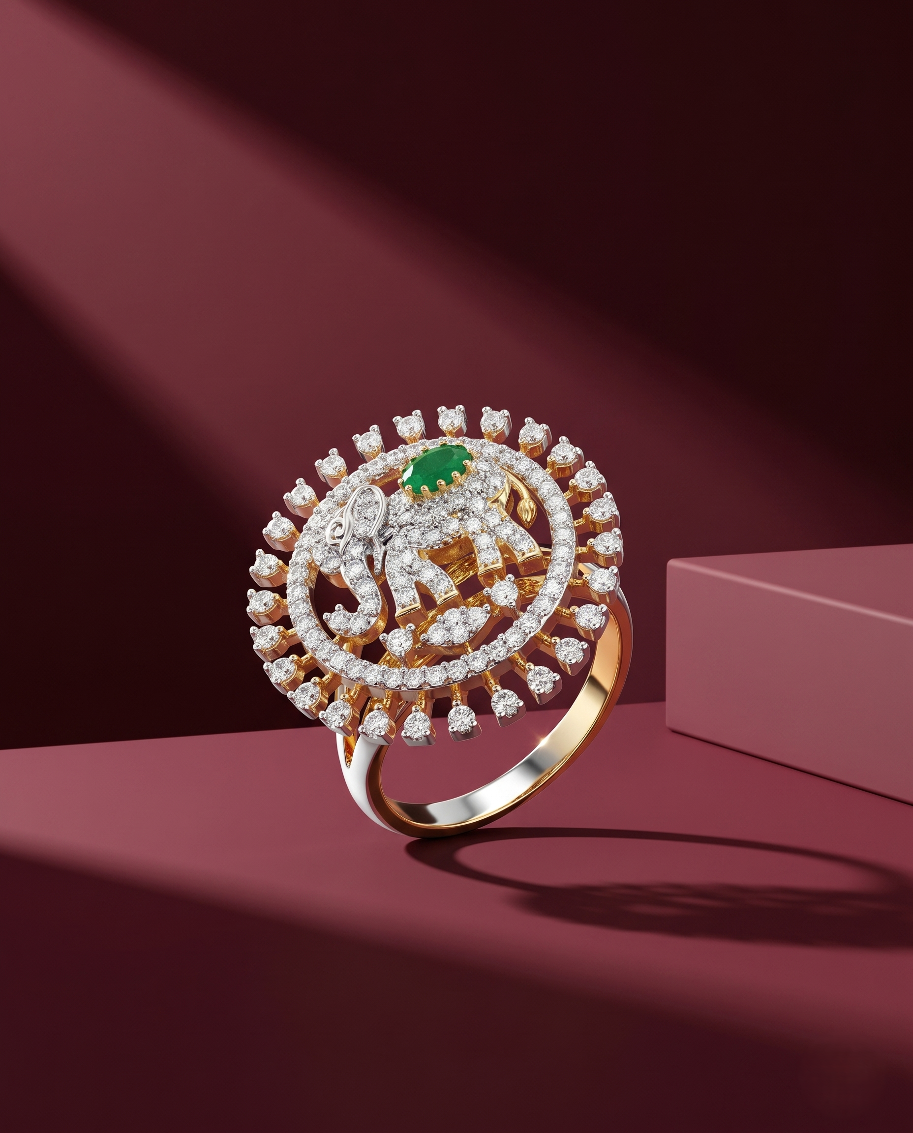 Gold ring with diamonds and a green gemstone on a red background