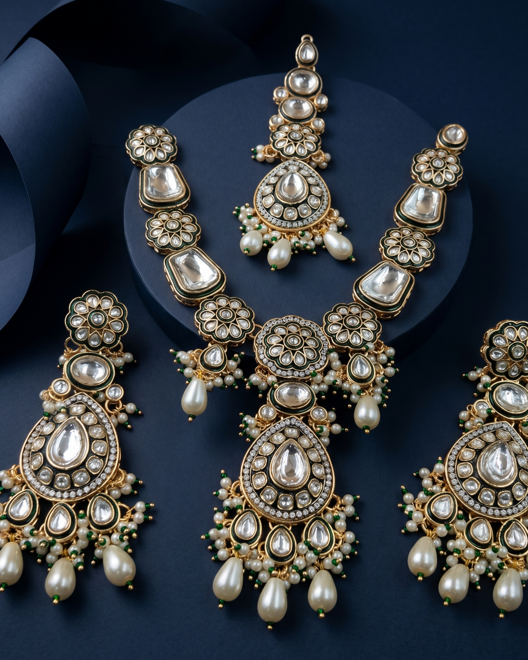 Green Kundan Necklace Set with Pearl Drops – Heavy Traditional Indian Jewellery with blue background 
