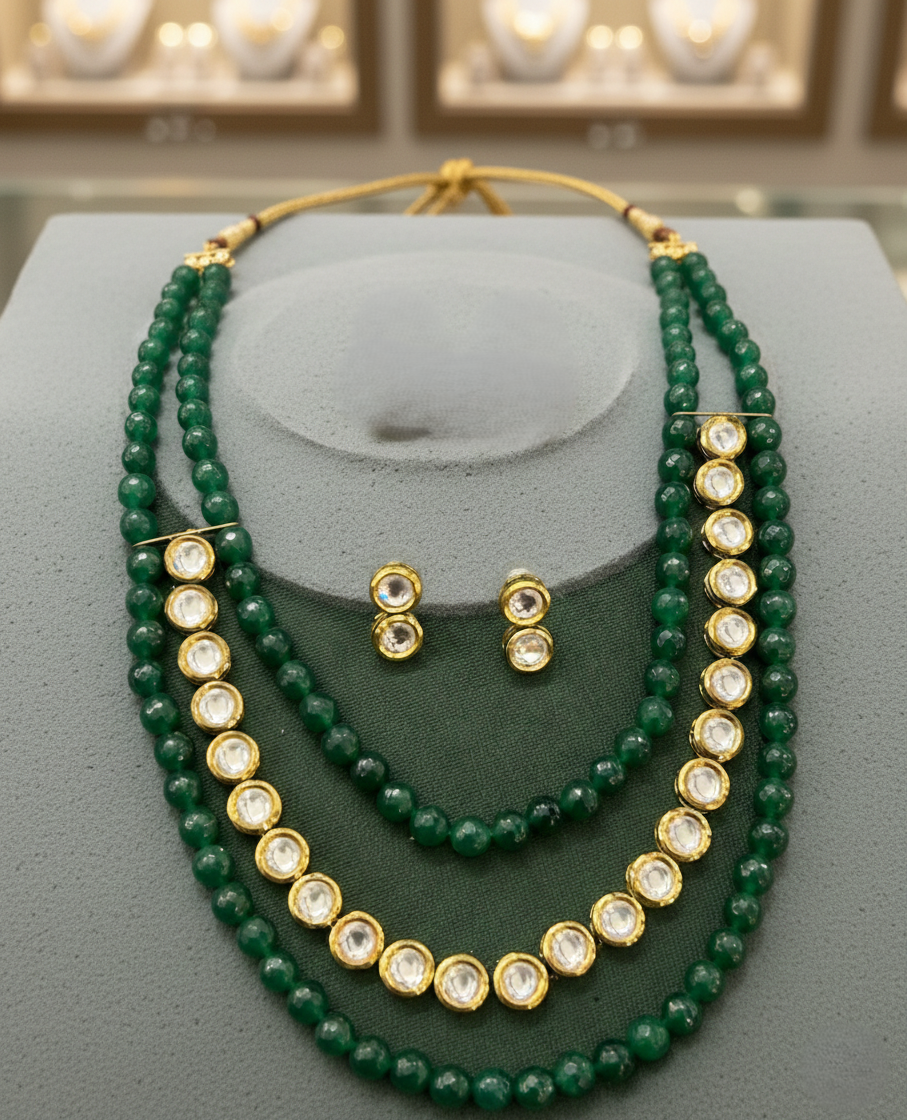 Green bead kundan necklace set paired with classic stud earrings in gold tone