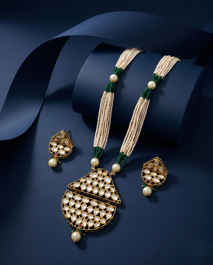 Jewelry set necklace and earrings on a dark blue background