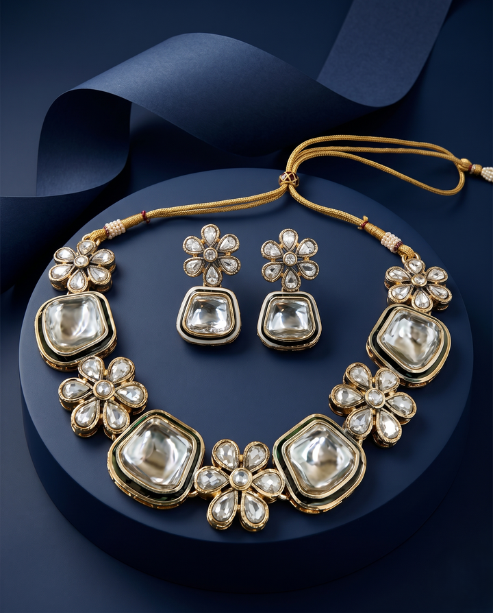 Jewelry set necklace earrings a dark blue background