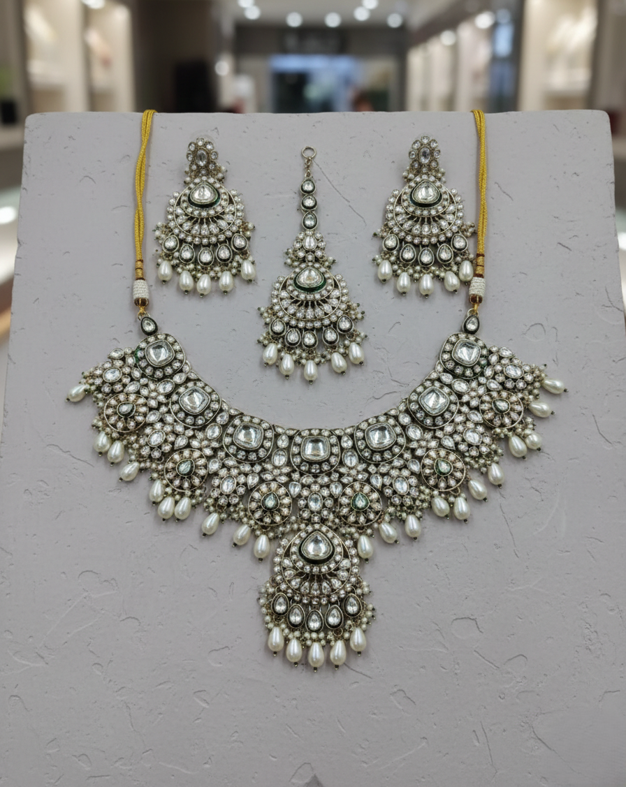 White kundan pearl bridal necklace set with earrings and maang tikka, traditional Indian jewellery