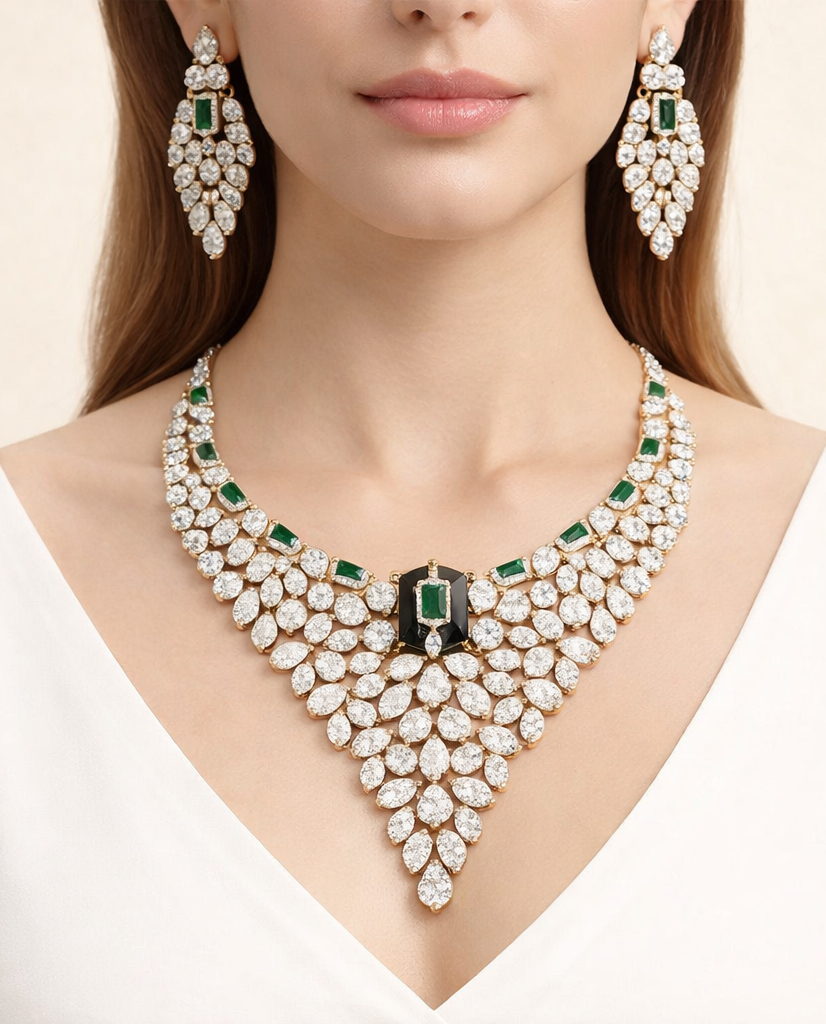Jewelry set with necklace and earrings featuring emeralds and diamonds on a neutral background