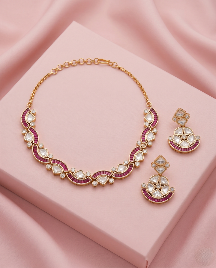 Jewelry set with necklace and earrings on a pink fabric background