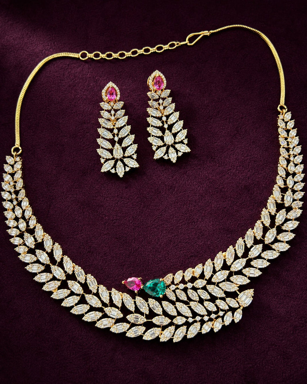 Jewelry set with necklace and earrings on a purple background