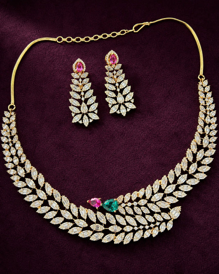 Jewelry set with necklace and earrings on a purple background