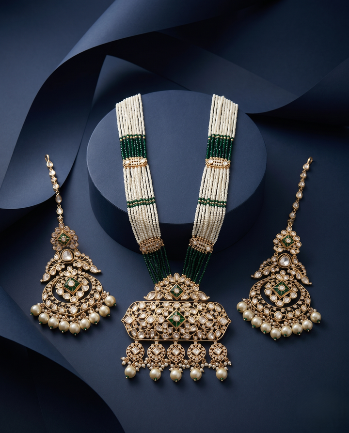 Jewelry set with necklace, earrings, and bracelet on a dark blue background
