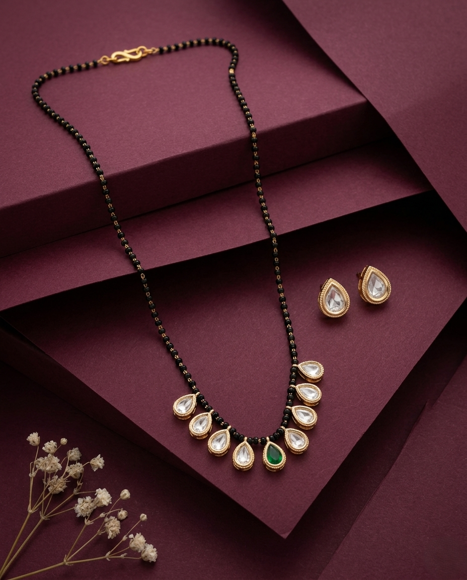 Jewelry set with necklace and earrings on a maroon background