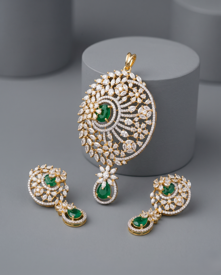 Jewelry set with pendant and earrings on a gray background