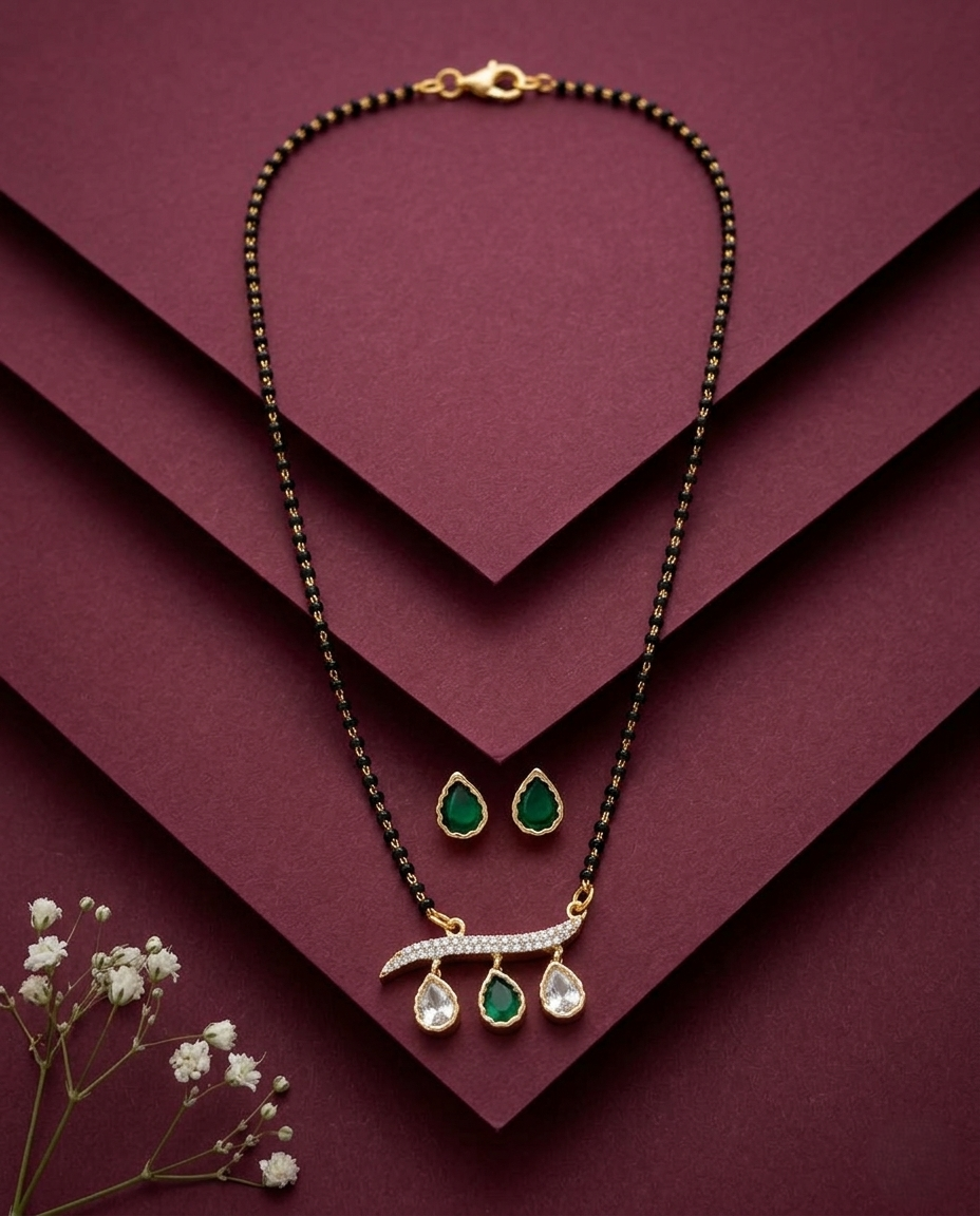 Jewelry set with necklace and earrings on a maroon background