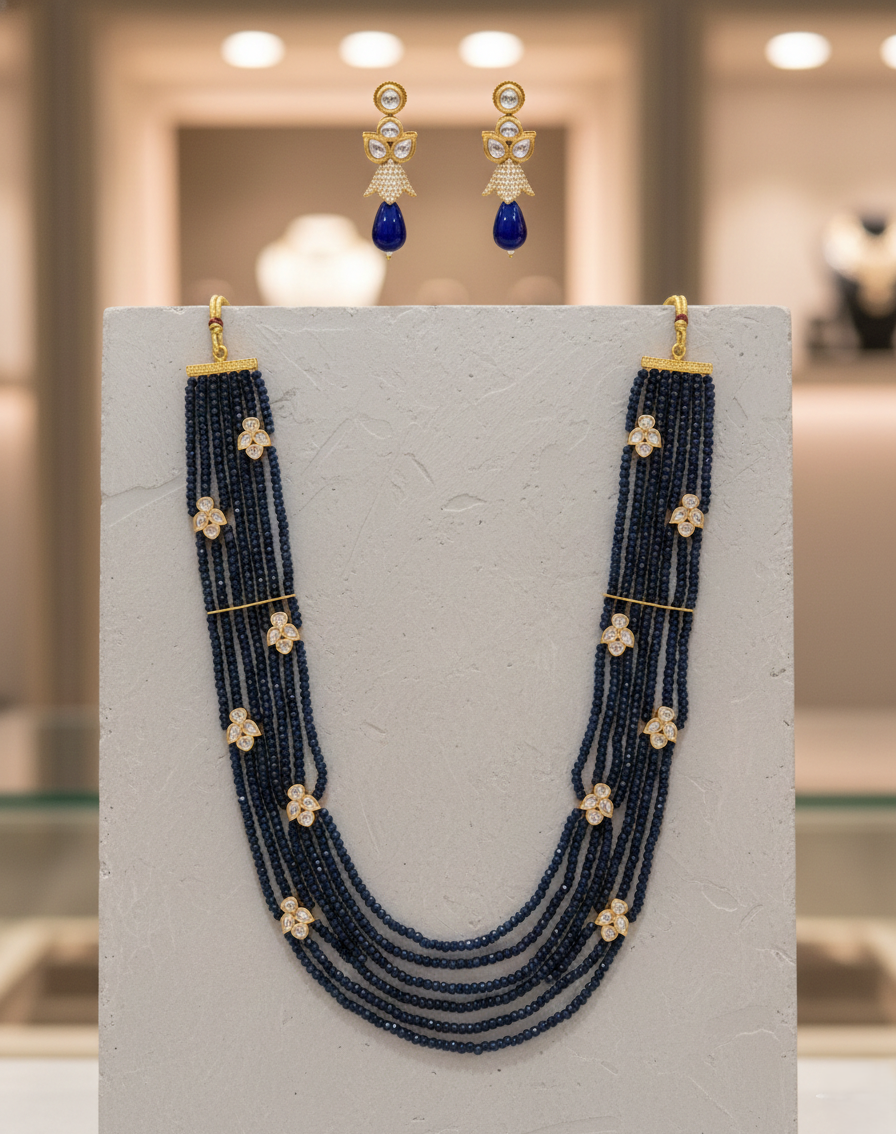 Navy blue bead kundan necklace set paired with matching earrings for women