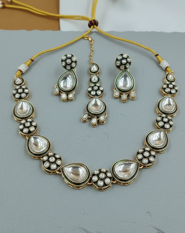 Polki kundan necklace set with pear shaped stones and matching earrings, traditional Indian jewellery