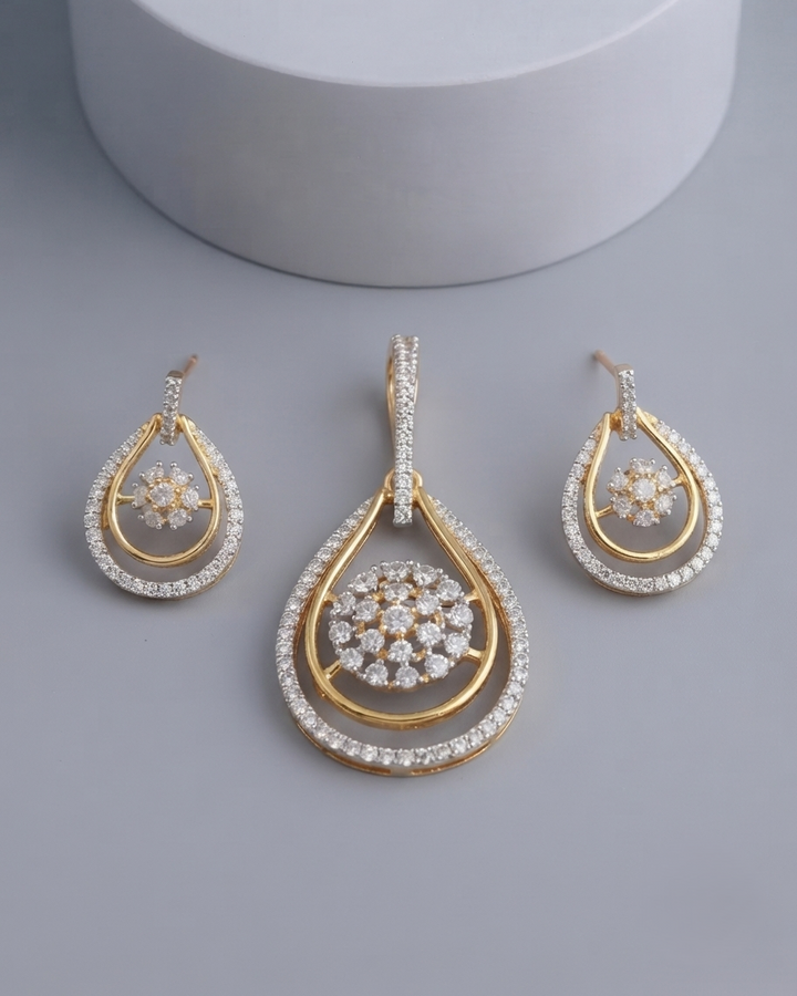 Shop the Noor Teardrop Elegance Pendant Set with secure screw-back earrings.