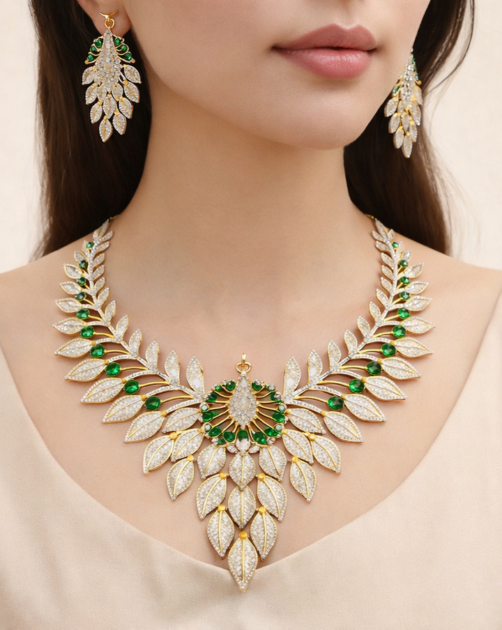 Ornate necklace with green gemstones and matching earrings on a model against a neutral background
