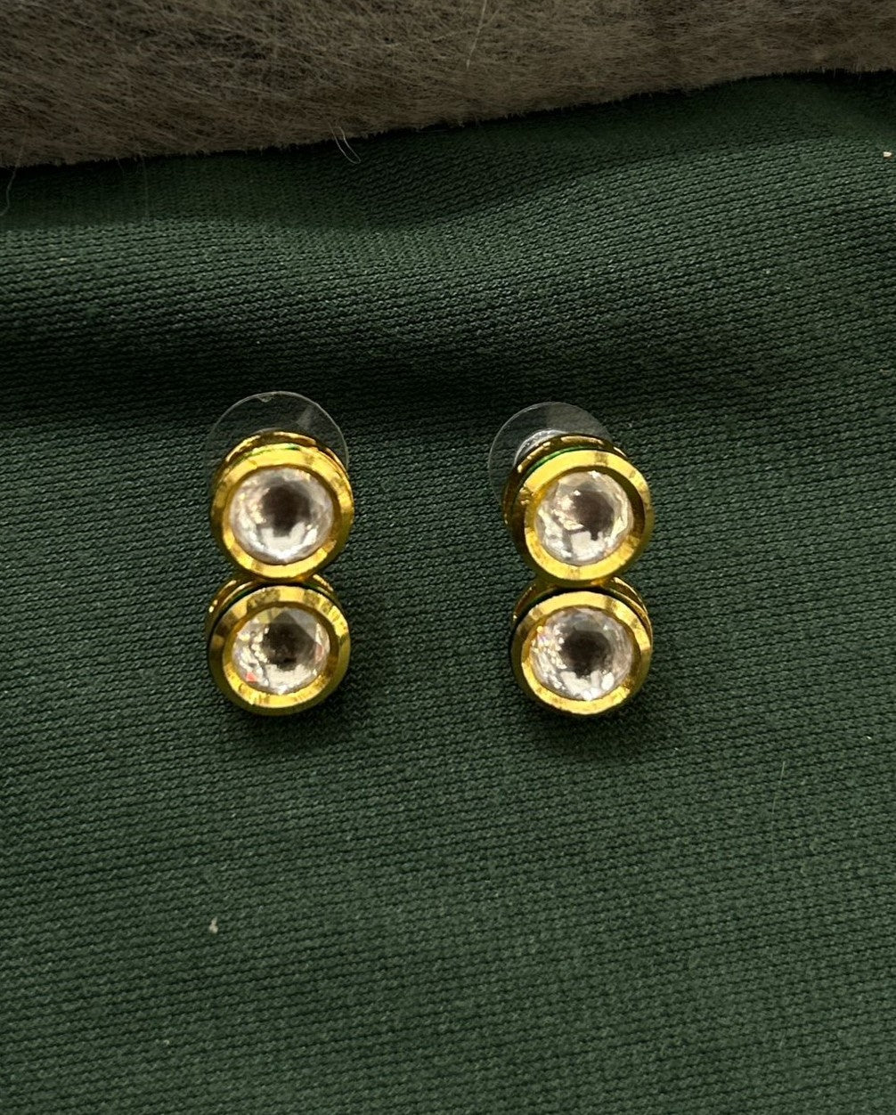 Traditional jewellery ensemble featuring green beads and refined kundan craftsmanship