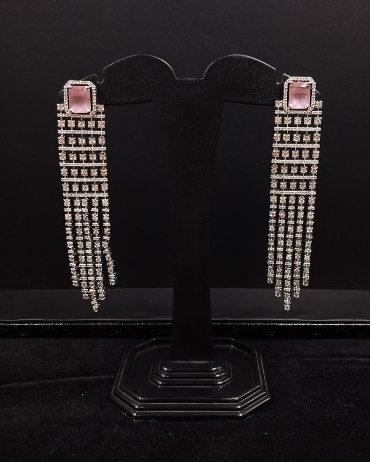 Pair of long, dangling earrings with pink gemstones diamond silver finsh real look imitation jewelry