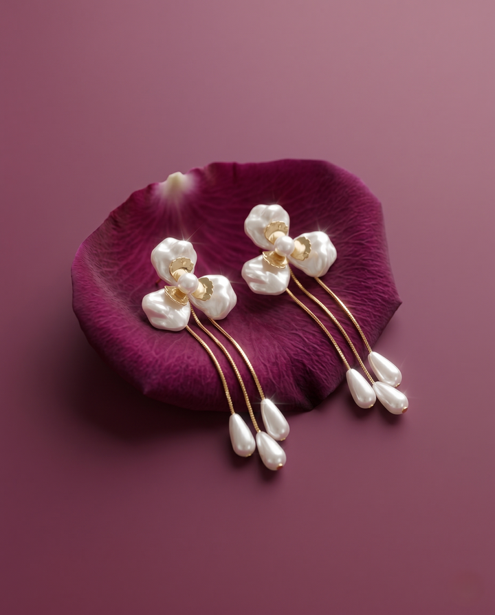 Pearl hairpins on a purple petal against a matching background